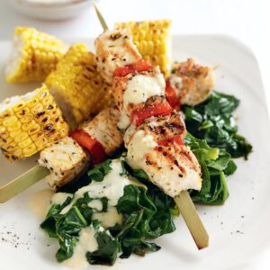 Grilled chicken skewers with hummus yoghurt
