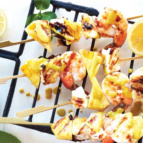 Seafood and pineapple skewers with coconut-curry sauce